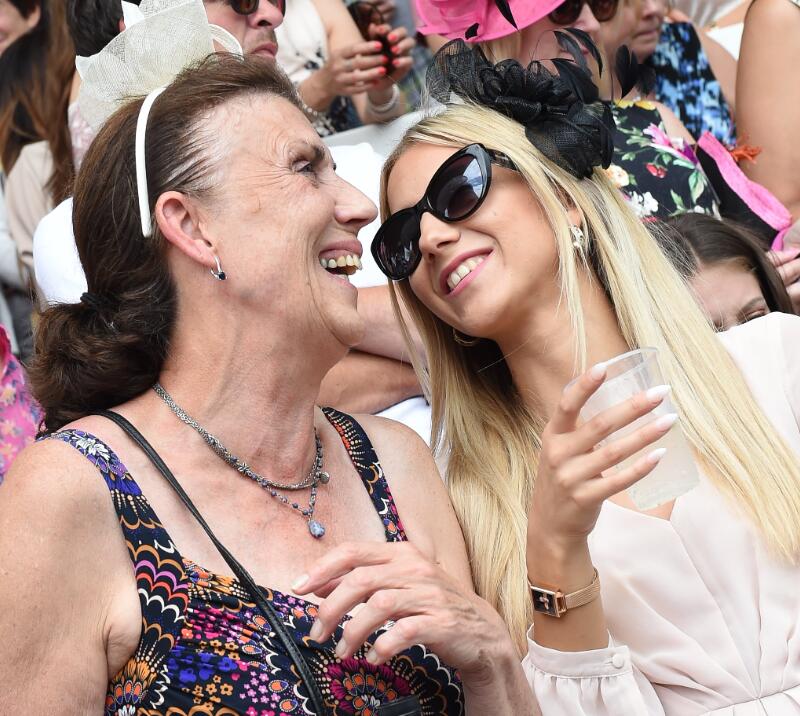 Two ladies enjoying their day at Lingfield Park Races