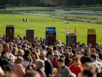 The crowd at Lingfield in front of the bookmakers and the track