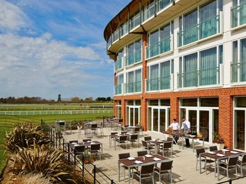 The restaurant patio and hotel exterior of Lingfield Park Hotel