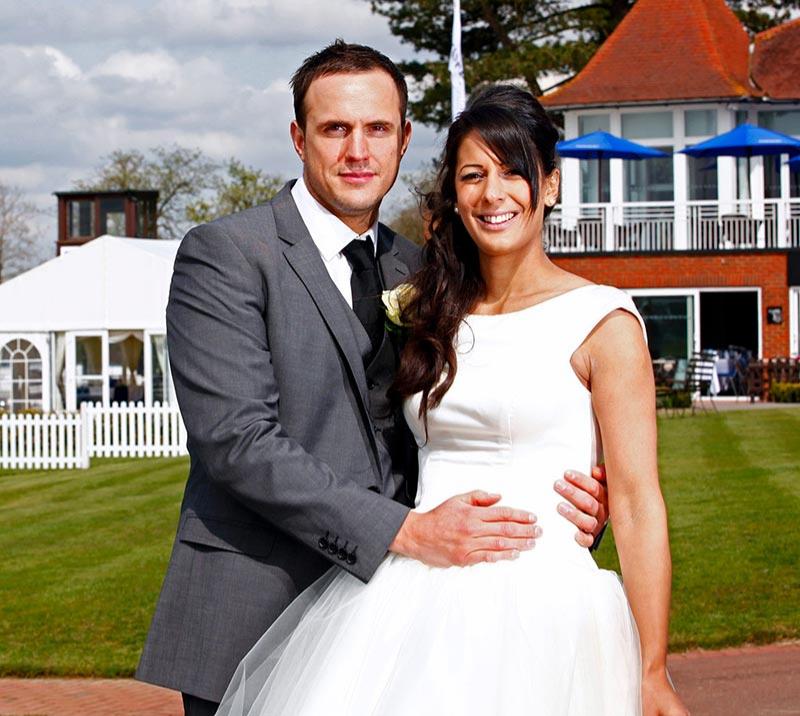 Newlywed couple in front on Eclipse Suite.