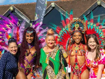 caribbean dancers with lingfield crowd